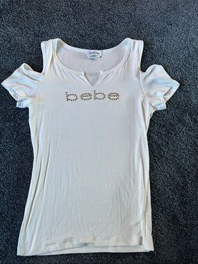 bebe Cream Cold-Shoulder Logo Ribbed Tee with Crystal Accents